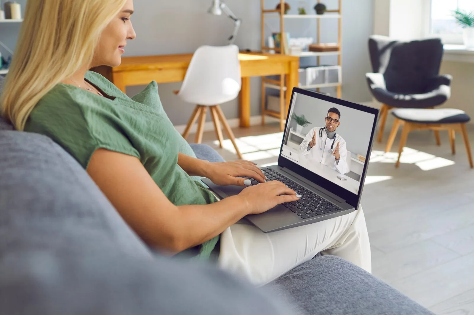 Woman on a video visit with a provider – online psychiatry in Dearborn, MI